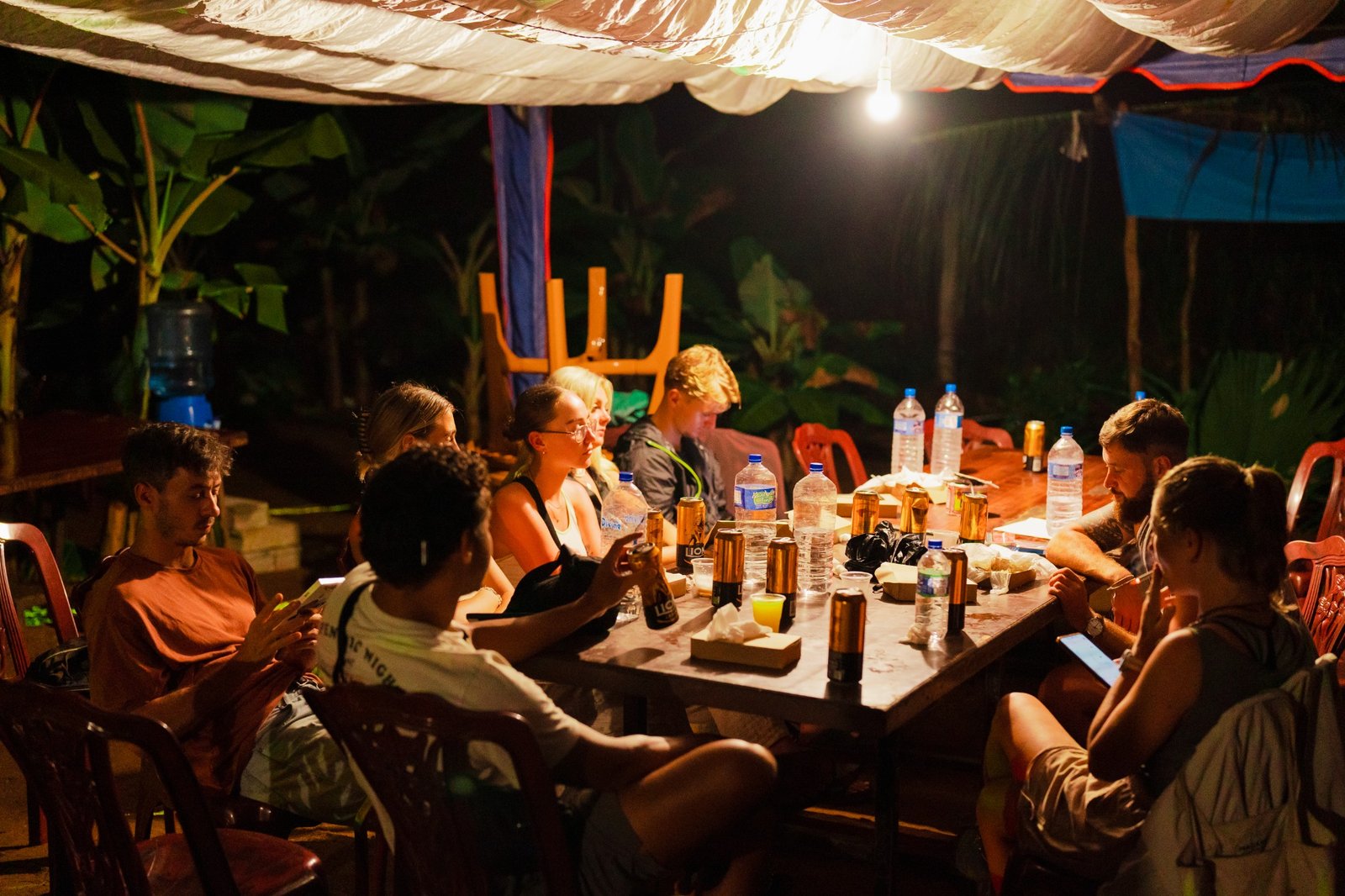 Travellers sharing dinner together at AnotherWorld Sigiriya